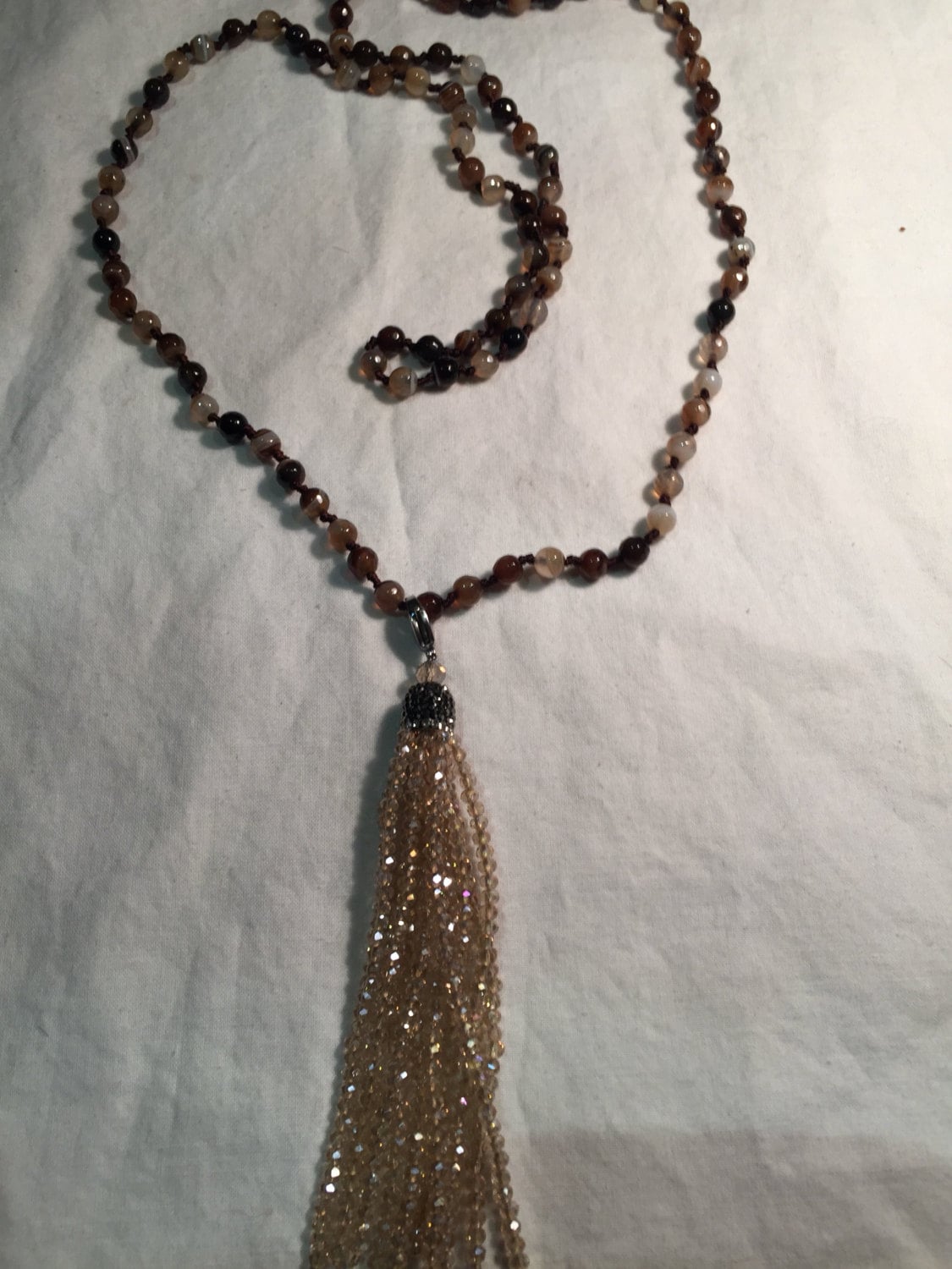 Handmade Brown Striped Onyx and Crystal Tassel Necklace
