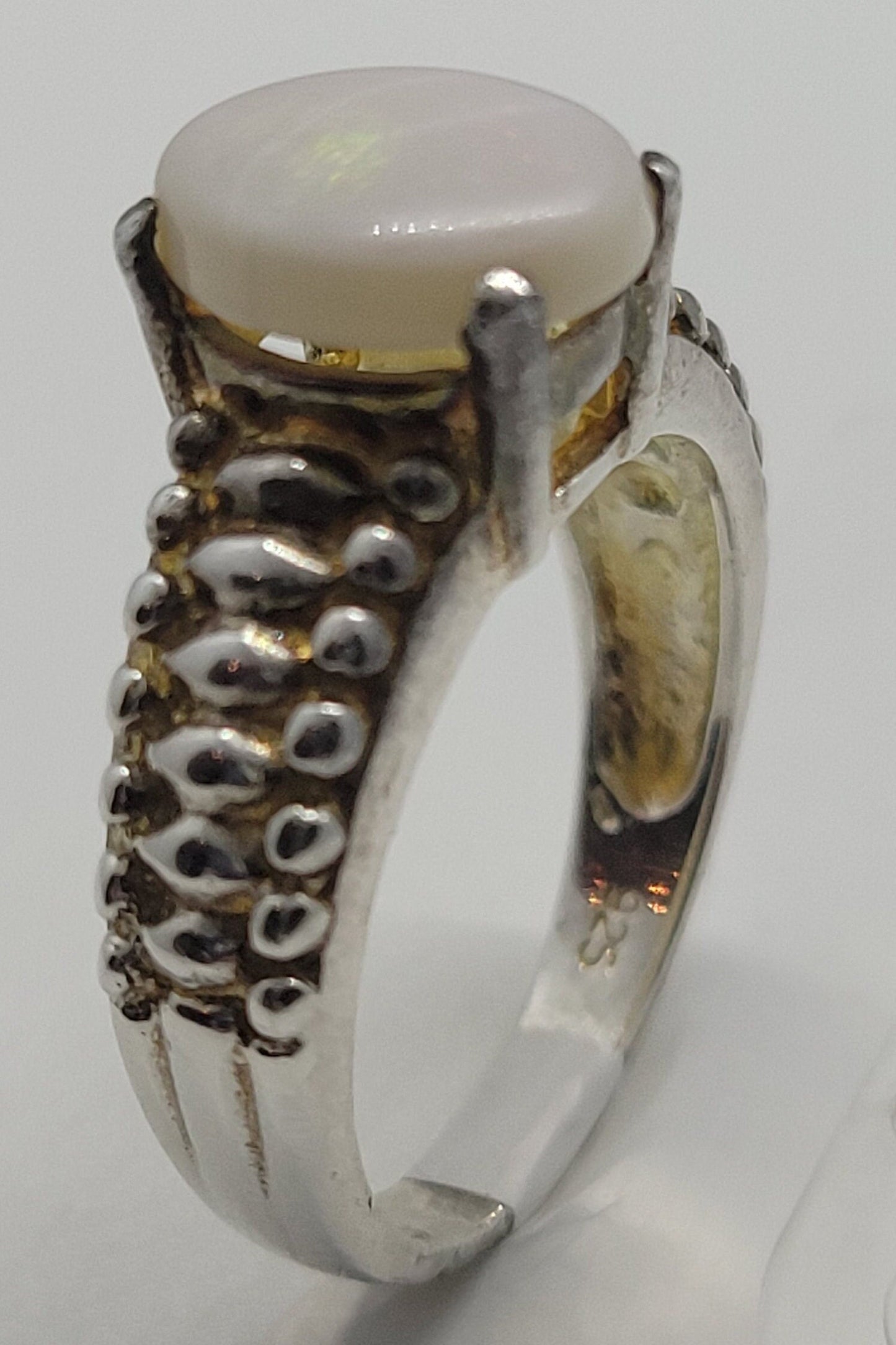 White Fire Opal Ring in 925 Sterling Silver on white background