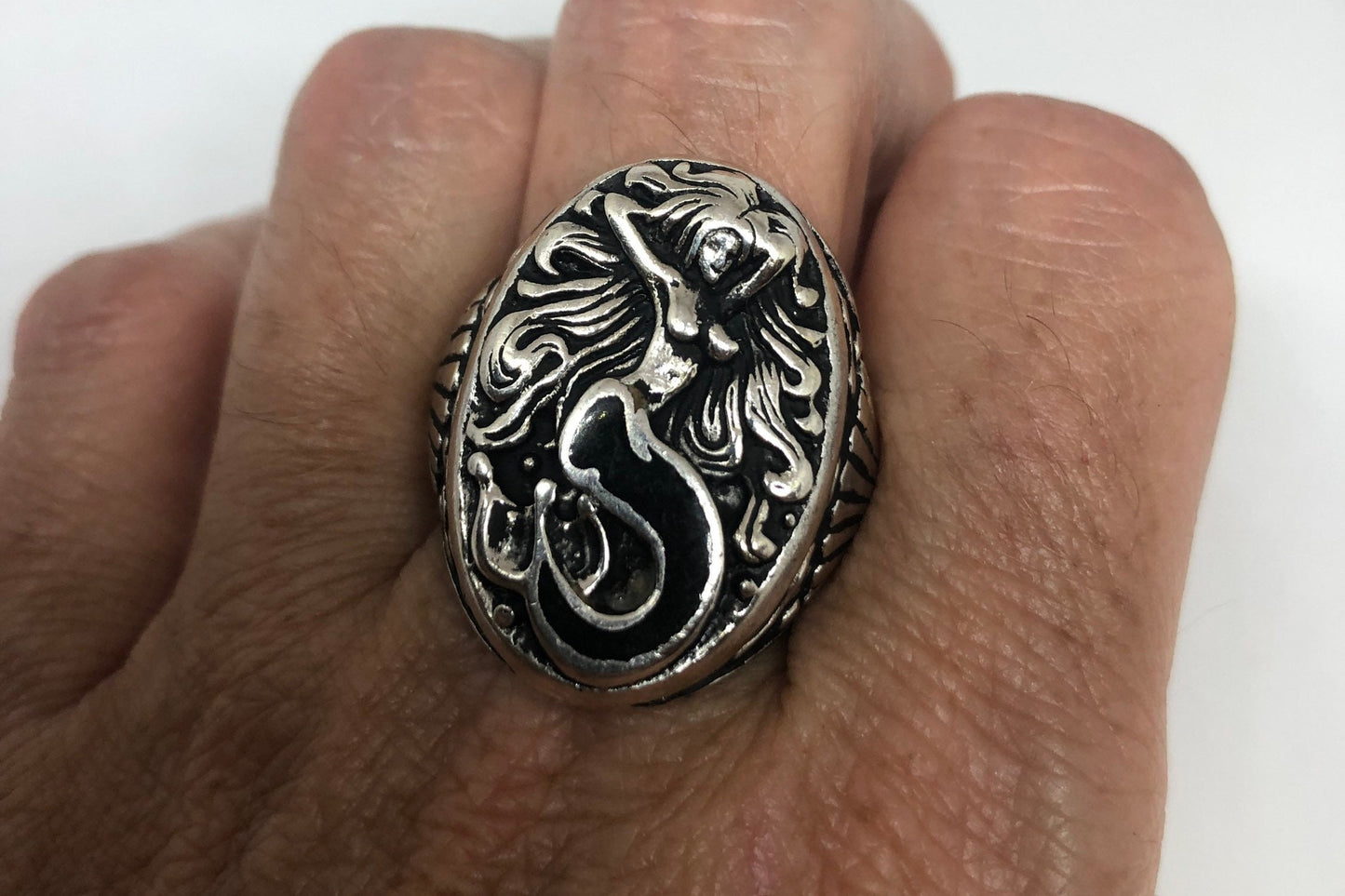 Mermaid ring with black resin inlay in white bronze