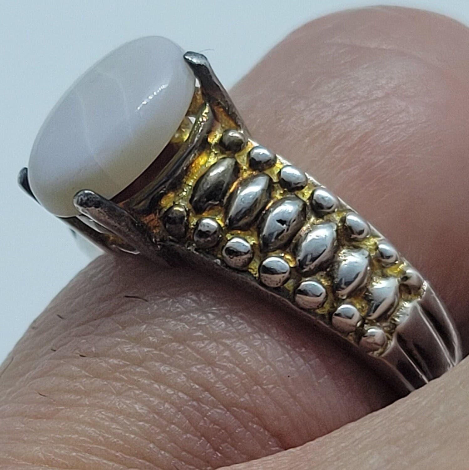 White Fire Opal Ring in 925 Sterling Silver on finger