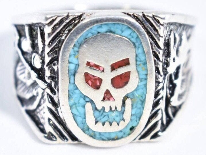 Skull ring with blue turquoise and red coral in white bronze on white