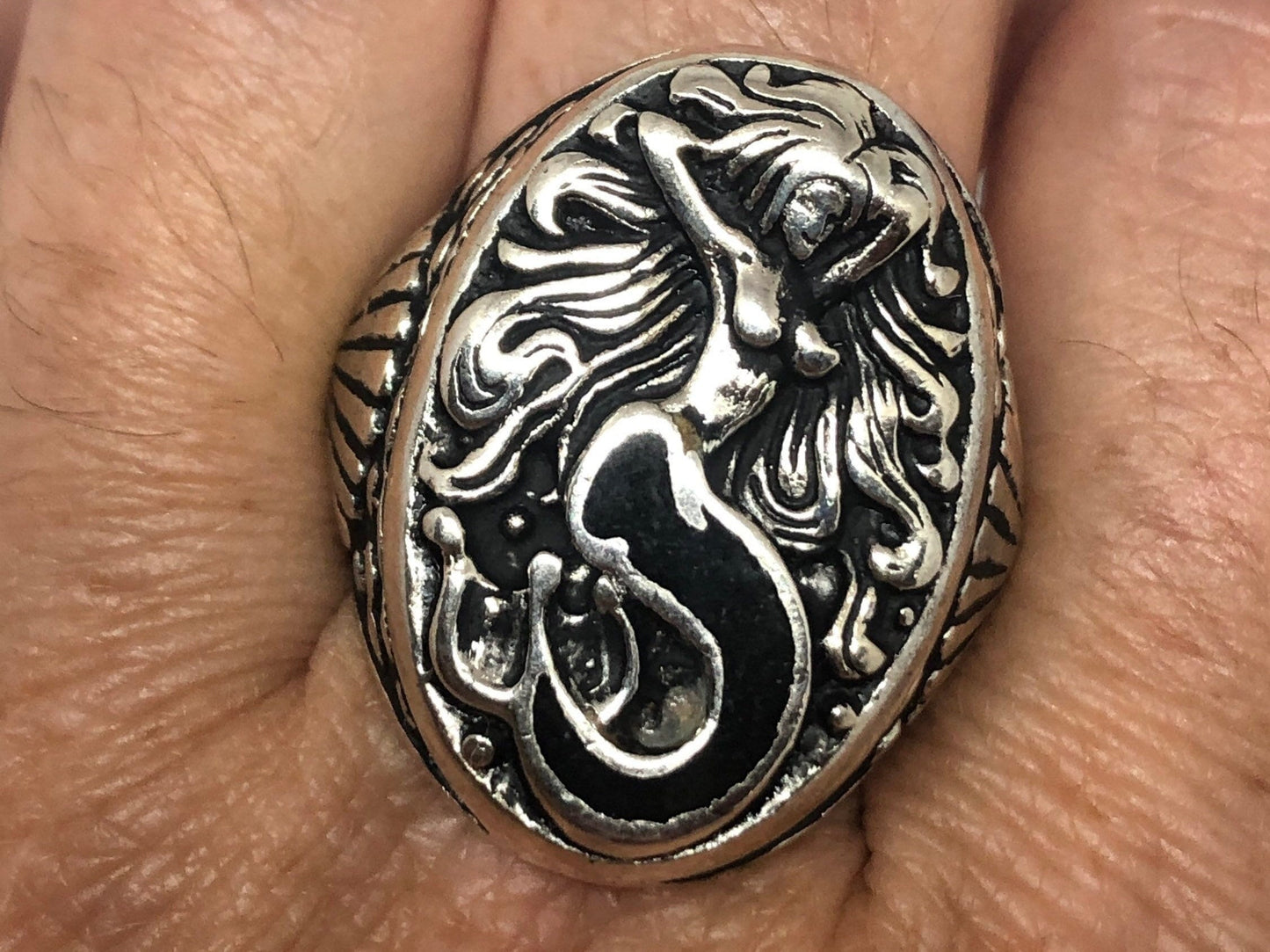 Mermaid ring with black resin inlay in white bronze