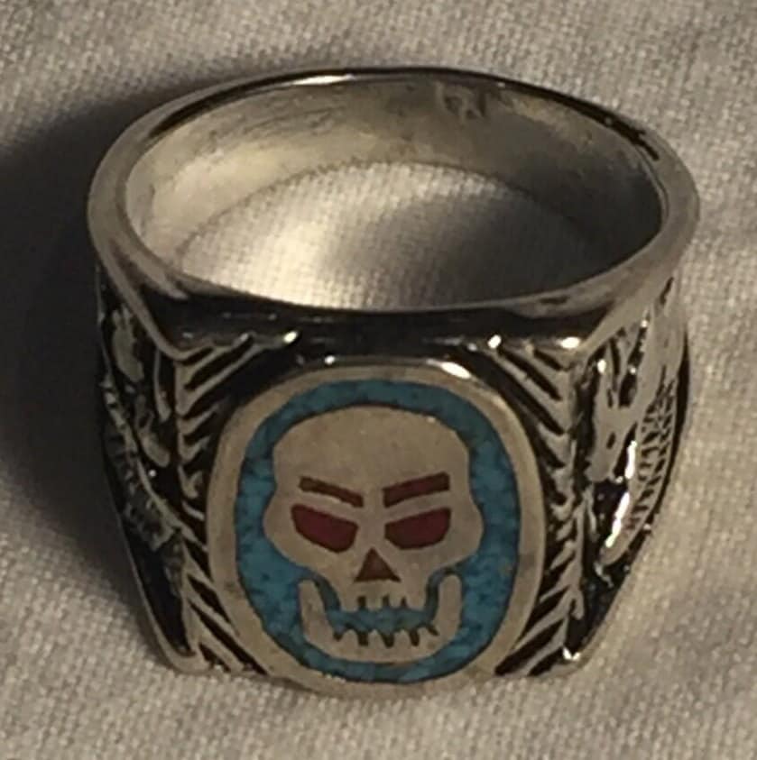 Skull ring with blue turquoise and red coral in white bronze
