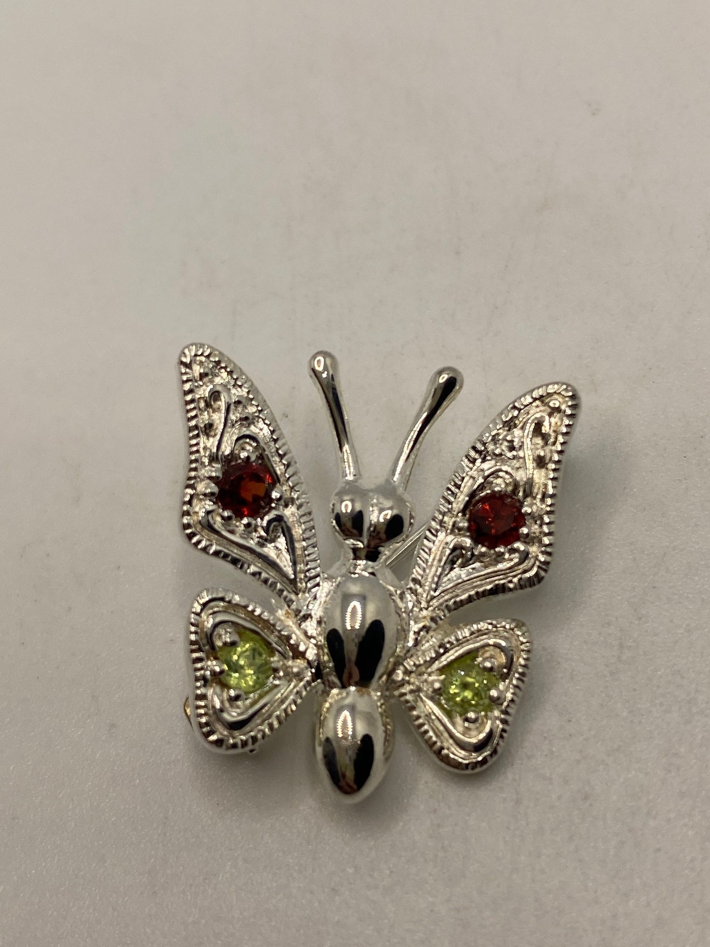 Vintage Handmade Garnet and Peridot Sterling Silver Butterfly Brooch